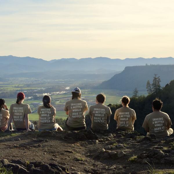 People from the back sitting looking out at a view